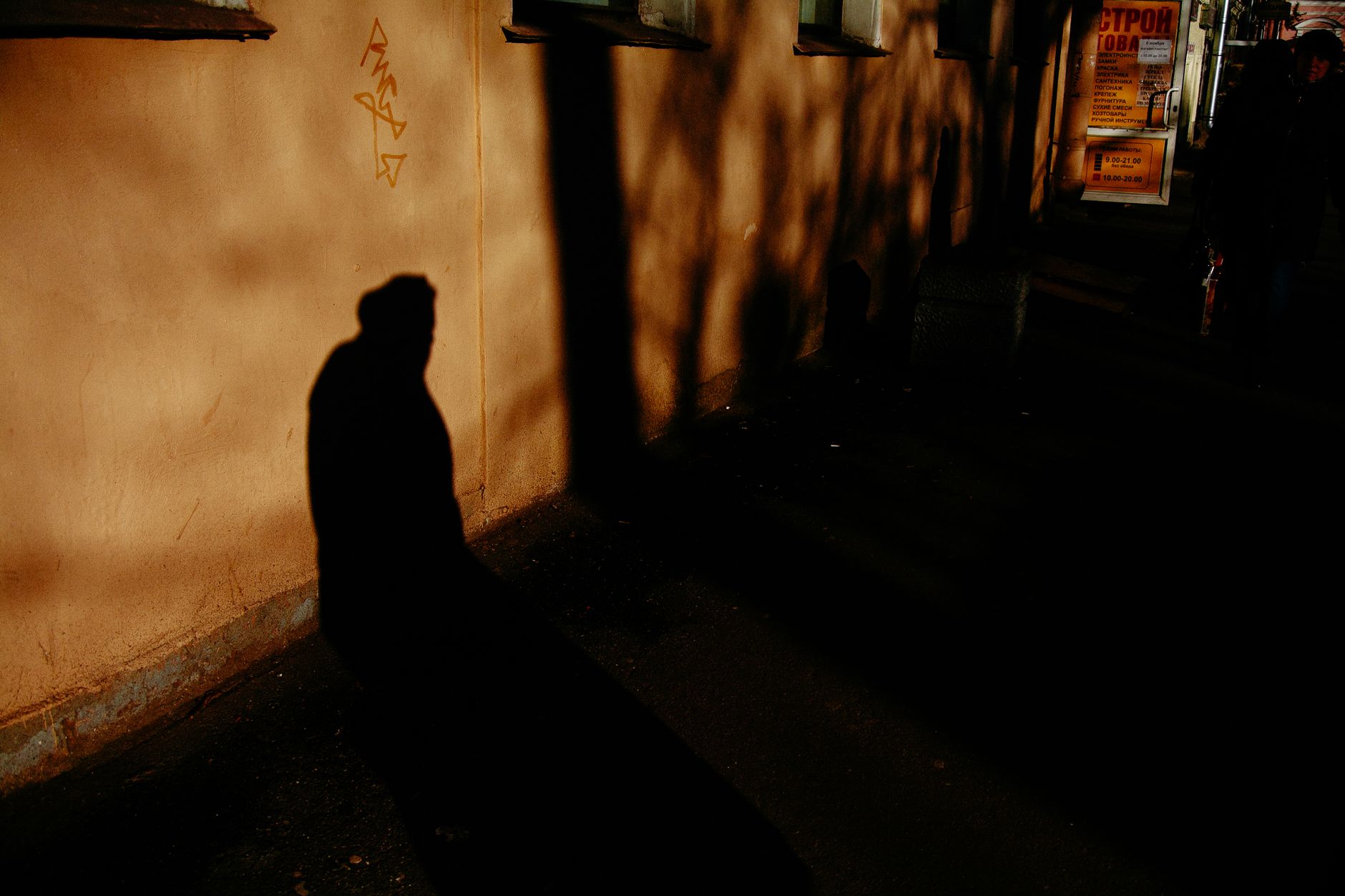 Shadow silhouette in a mysterious city (image illustrative)