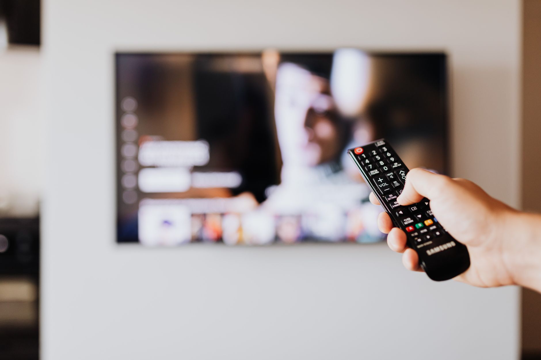 Streaming service on TV with remote control (illustrative image)