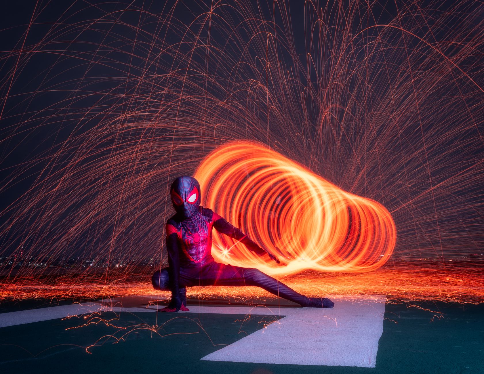 Superhero silhouette in the city at night (illustrative image)