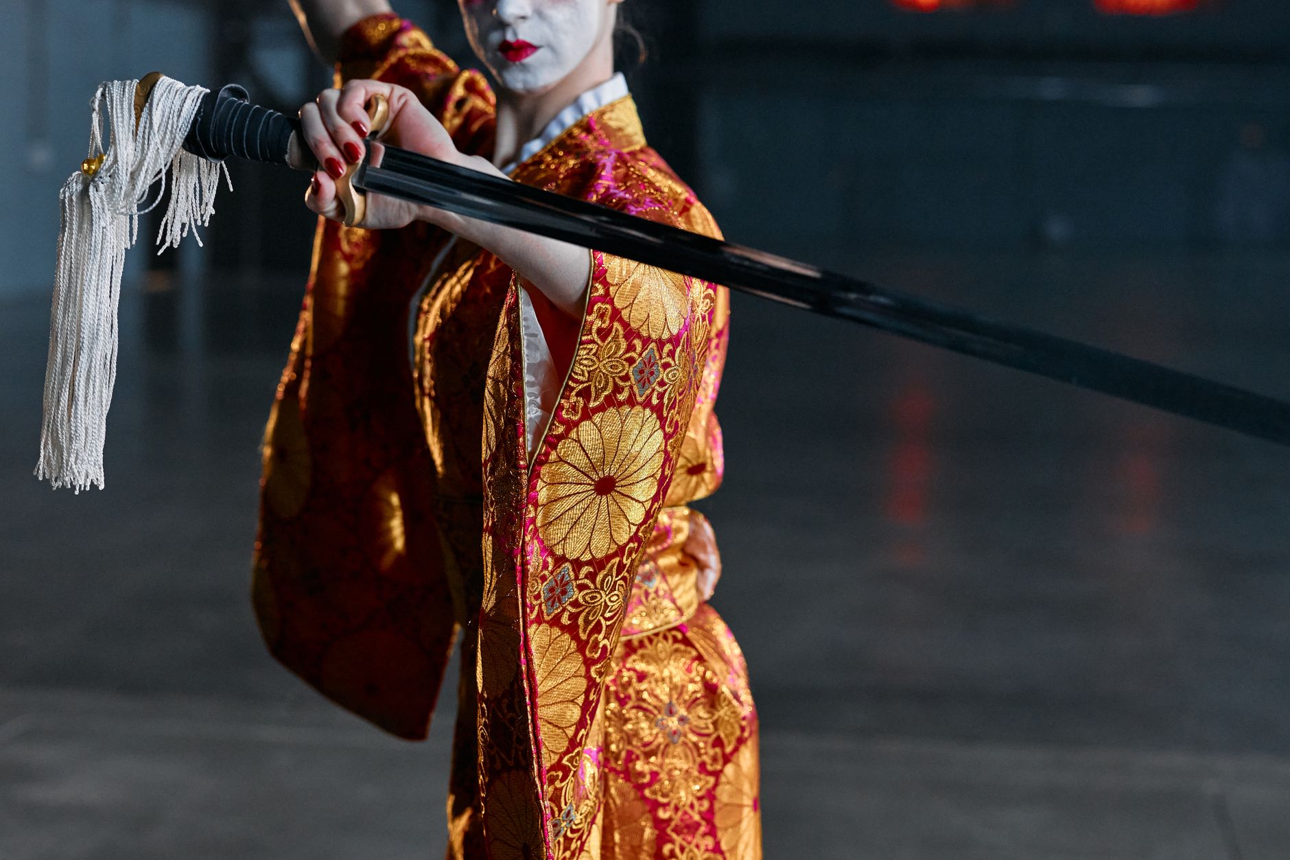 Japanese katana displayed on a wooden stand, a nod to the Sengoku-era weapons featured in Inuyasha